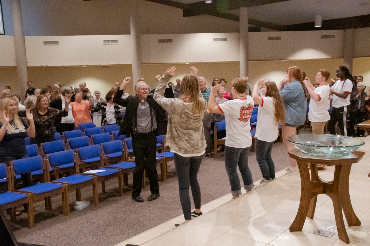 September 29, 2019: Members of the group that attended the 2019 Youth Triennium lead the congregation in a Worship energizer.