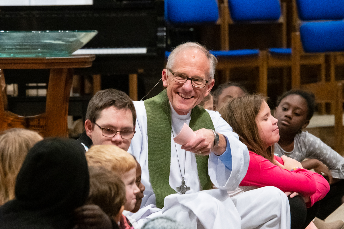 October 13, 2019:  Smiling at the response to his question, Pastor Bob Keefer shares with the young disciples during the Children’s message