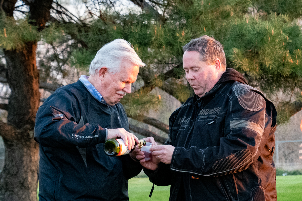 April 21, 2019:  Sometimes serving Communion straight from the bottle is more practical when you are out on the lawn for sunrise Easter service.