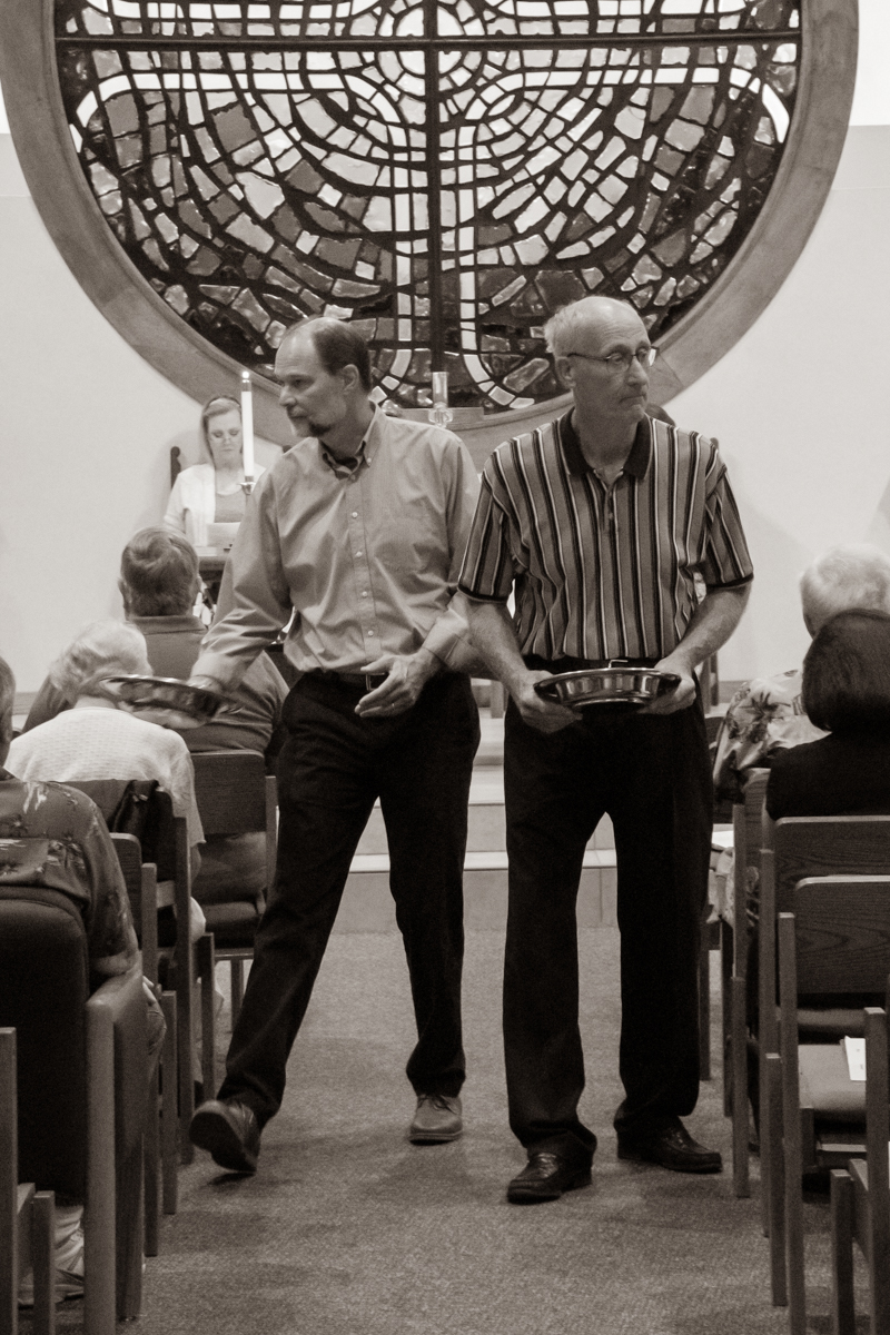 June 23, 2019:  Dylan Johnson and Tim Lambert assist Sunday service as ushers collecting the offering. 