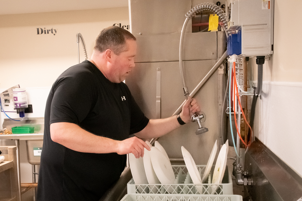 January 27, 2019:  The Annual meeting included lunch which means clean-up.  Andy Zidon runs the dishwasher.