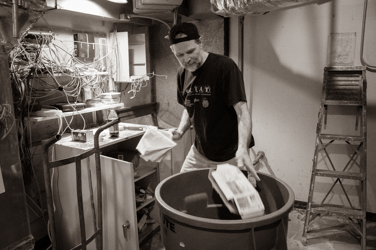April 6, 2019:  Dylan Johnson tackles cleaning a furnace room that had been collecting junk during the recent building renovation project.